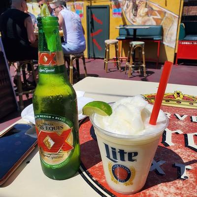 A bottle and a glass of beer