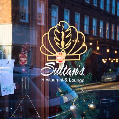 Restaurant logo on the window.