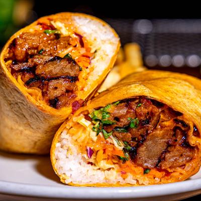 Viet Nom Nom wrap cut in half and served.