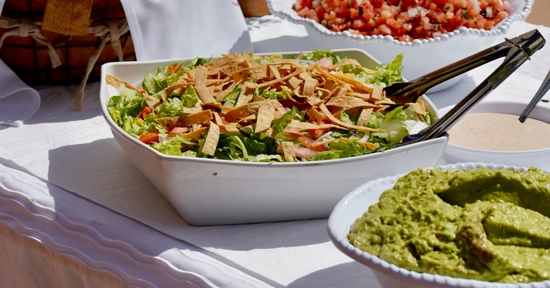 A table full of various served dishes