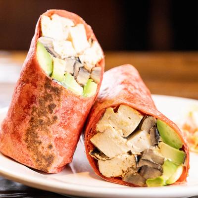 Grilled tofu wrap, side view.