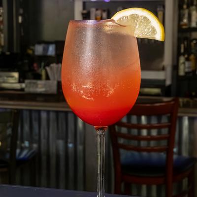 Aperol Spritz with lemon garnish.