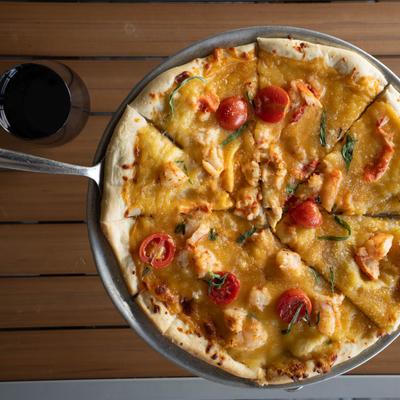 Shrimp lobster pizza, top view.