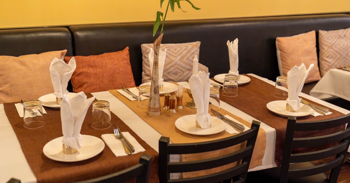 Interior, tables ready for guests