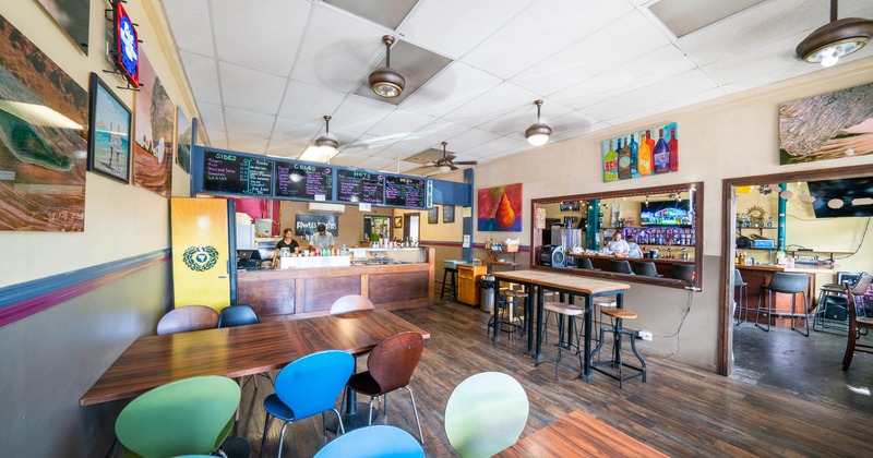 Dining area with pictures on the walls