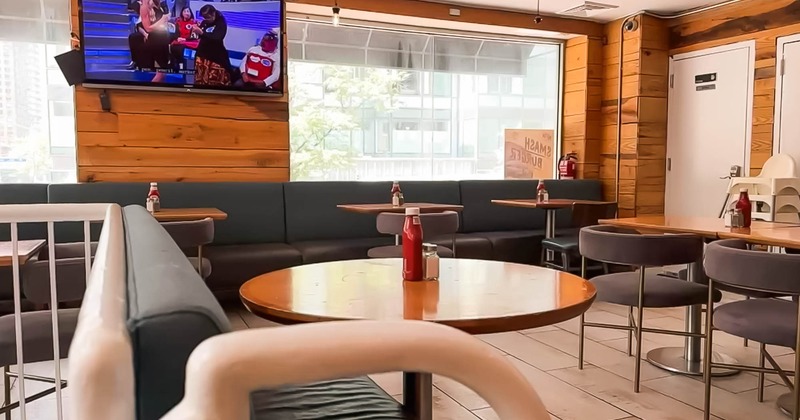 Interior, tables and chairs ready for guests