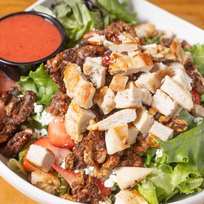 Chicken Avocado Chop Salad  with a citrus chipotle dressing on the side.