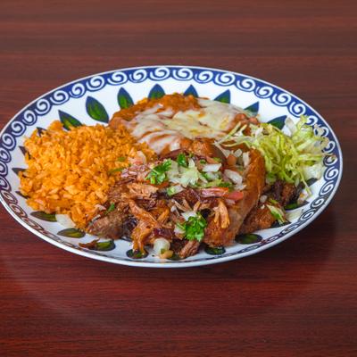 Simmered pork topped with cilantro and salsa, served with rice, beans and lettuce.
