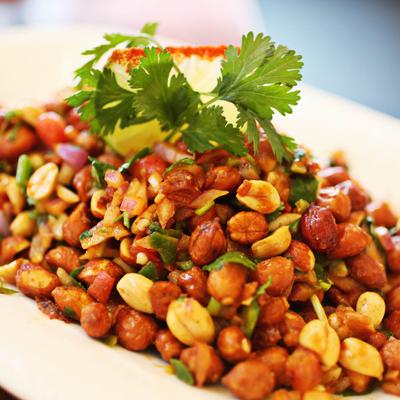 Close-up view of chickpea curry with cilantro.