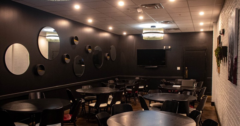 Round tables and chairs ready for guests