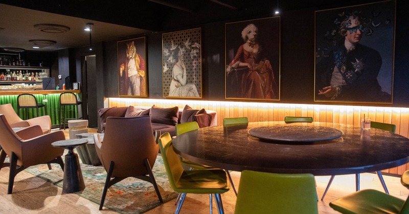 A modern lounge area with a large round table