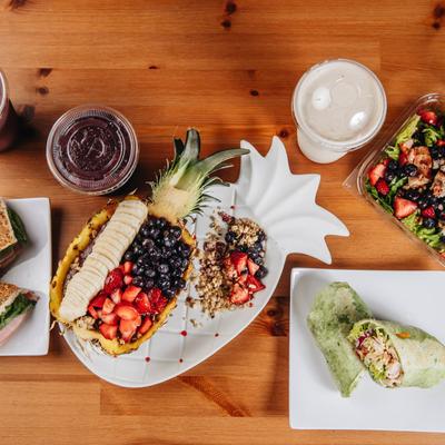 Assorted food and smoothies, top view.