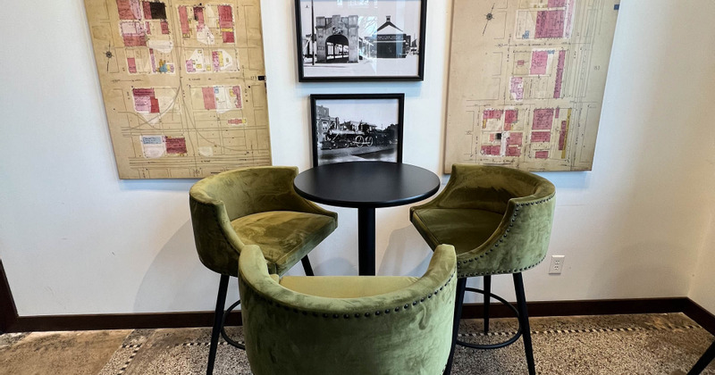 Interior, table with three armchairs