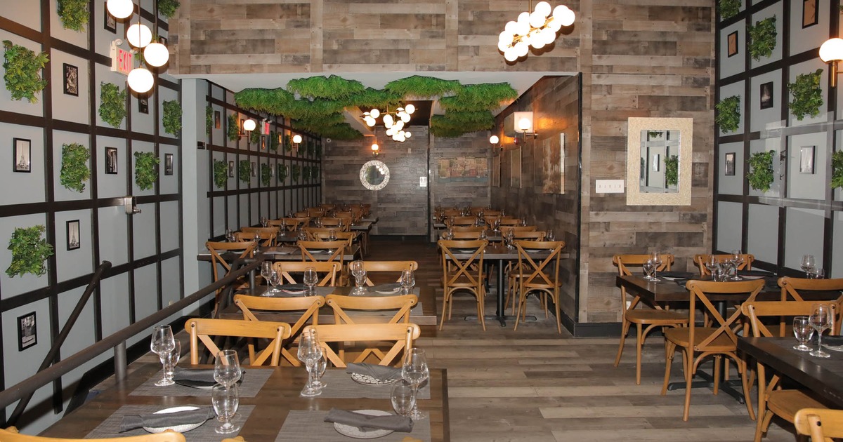 Interior, dining tables ready for guests