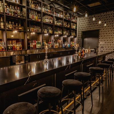 The serving counter and stools.
