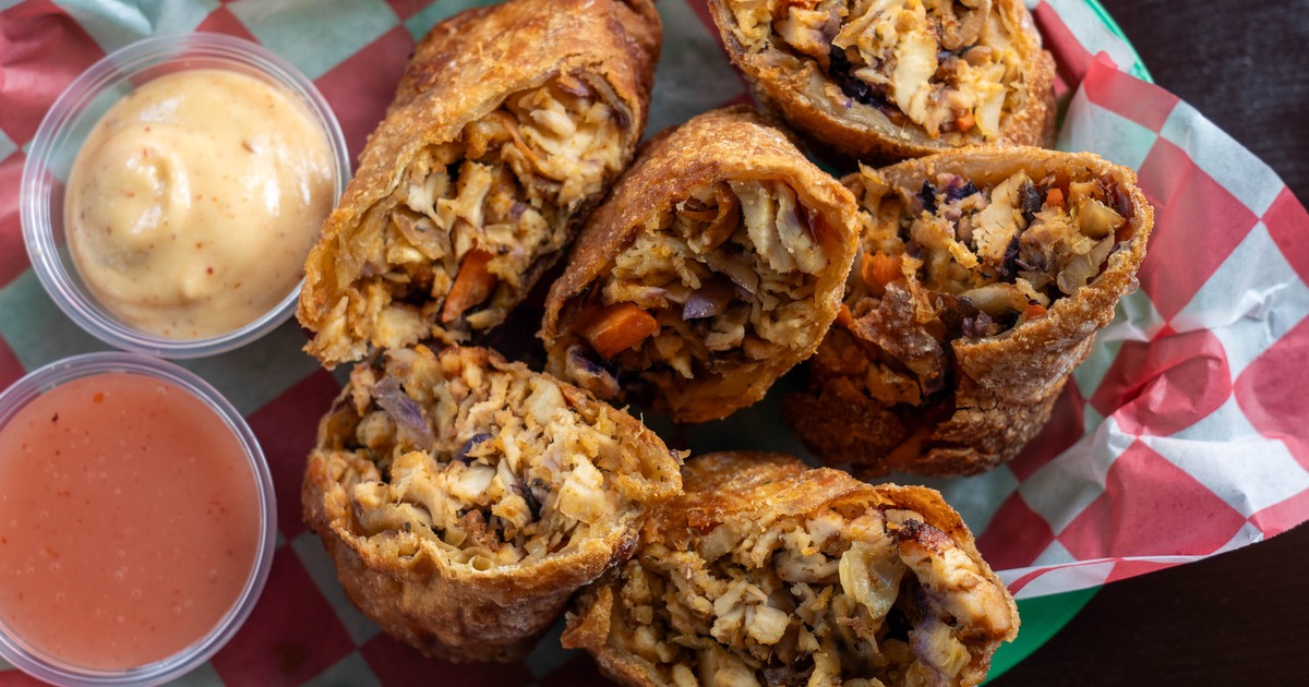 Roll With It Eggrolls served with ldipping sauces, overhead view