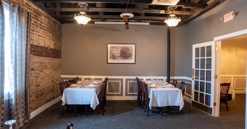 Interior, tables set for dining