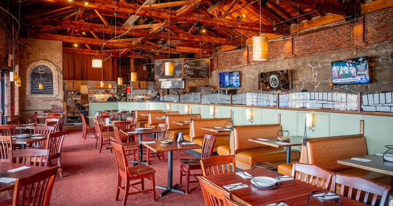 Interior, dining area, tables ready for guests
