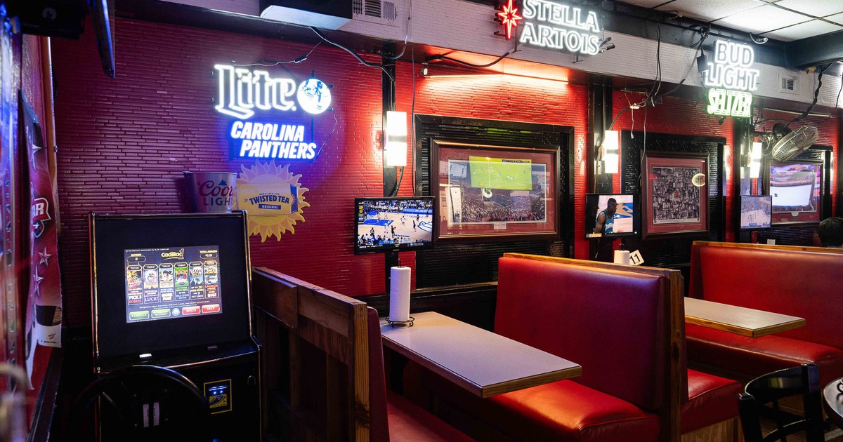 Interior, booths on the right and game arcade on the left