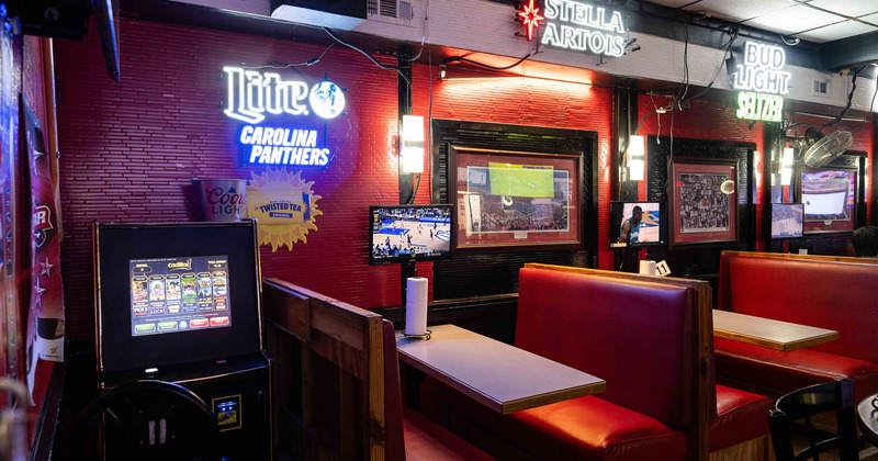 Interior, booths on the right and game arcade on the left