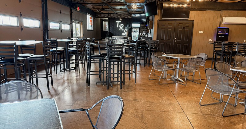 Interior, seating area with tables and chairs
