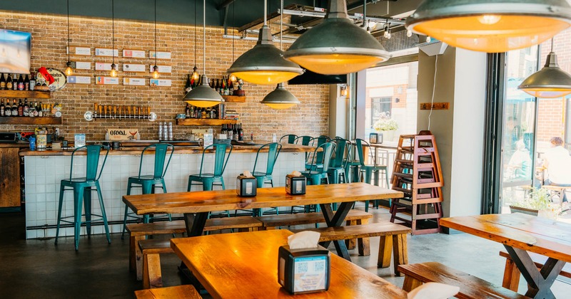 Interior, seating area with a bar in the back