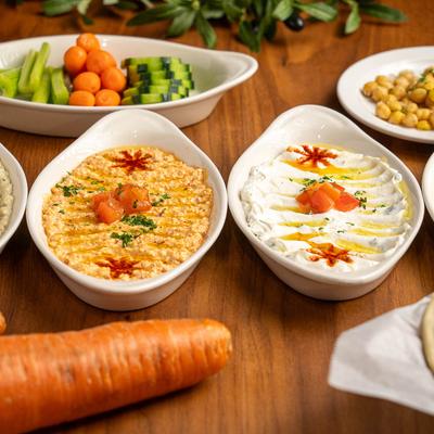 Various dishes and fresh vegetables.