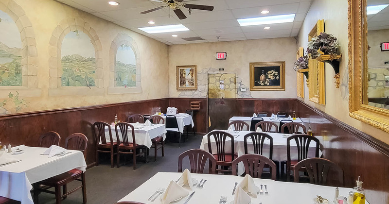Interior, seating area with tables lined up
