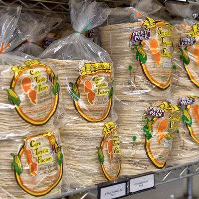 Tortilla packs on a shelf.