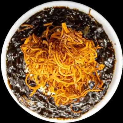 Noodle with pork and black bean sauce, topped with fried sweet potato strings.