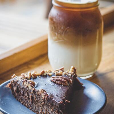 Chocolate cake dessert and a creamy beverage