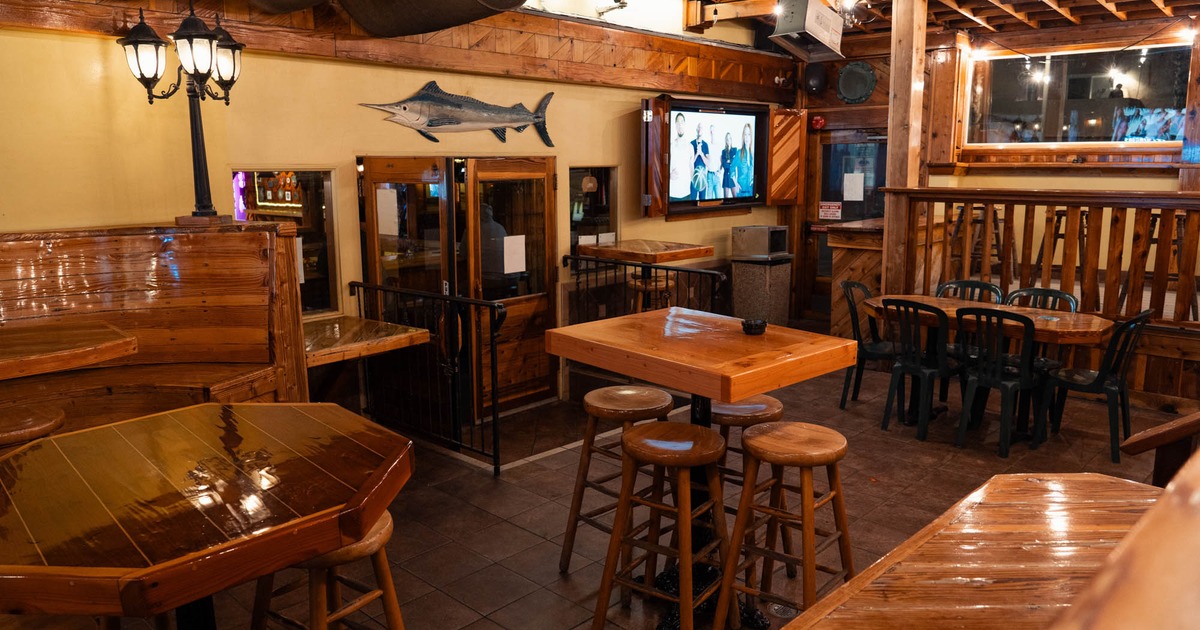 Interior, seating area with wooden tables and chairs