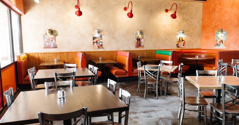Interior, dining area with booths, tables and chairs