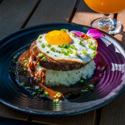 Loco Moco dish, Angus beef with steak sauce, fried egg, and sushi rice.