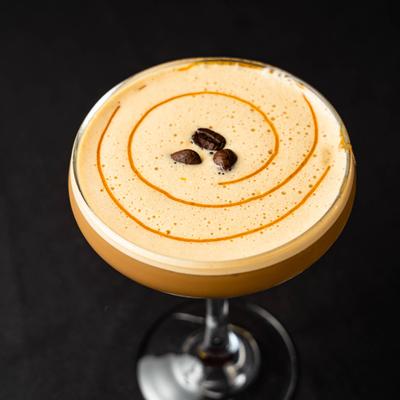 Espresso Martini with coffee bean garnish.