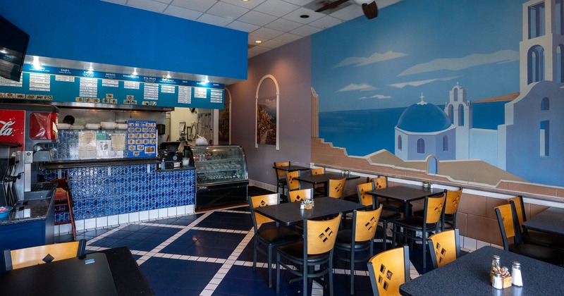 Interior, diner area, tables, chairs, food counter