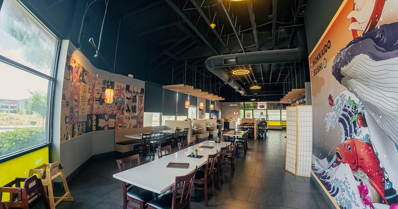 Spacious and modern sushi restaurant dining area