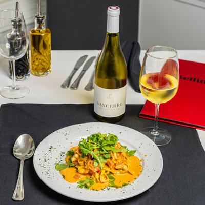 Crab meat pasta in creamy sauce, and white wine.
