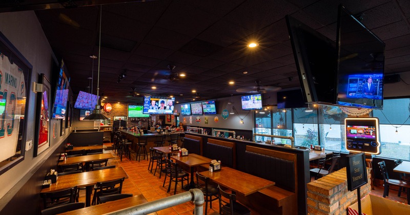Interior, seating area with booths, tables and chairs