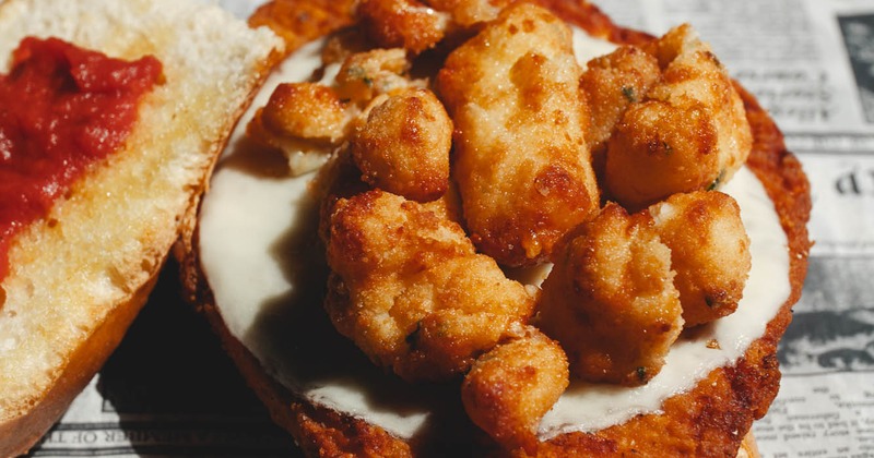 Chicken Parmesan sandwich with cheese curds