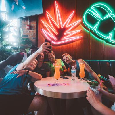 Interior, guests taking a selfie in the seating area