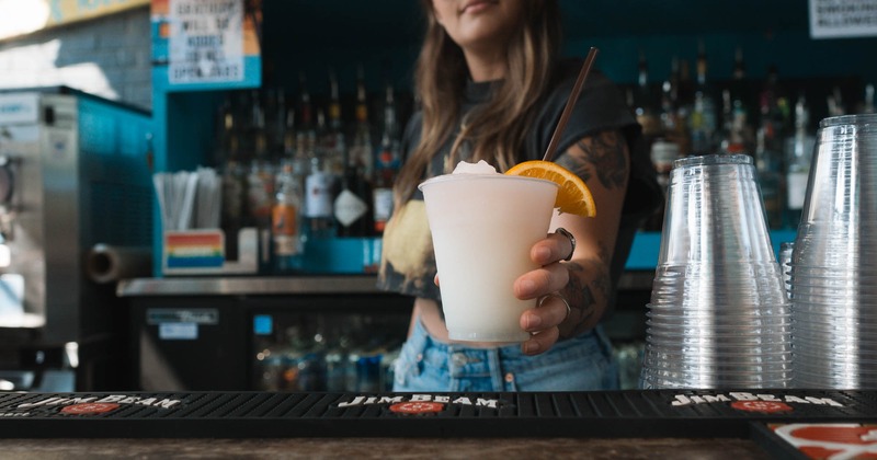 Bartender serving a cocktail