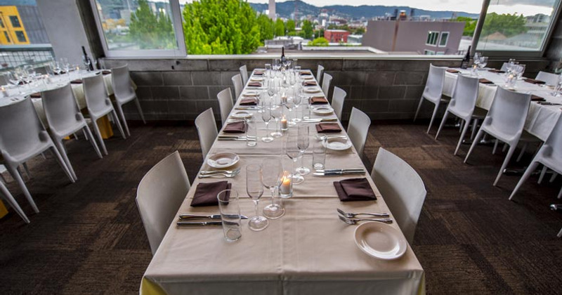 Interior, tables set for customers