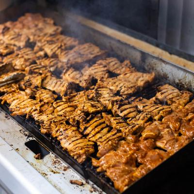 Chicken with seared lines grilling.