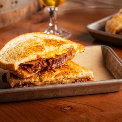 House-braised brisket melt sandwich.