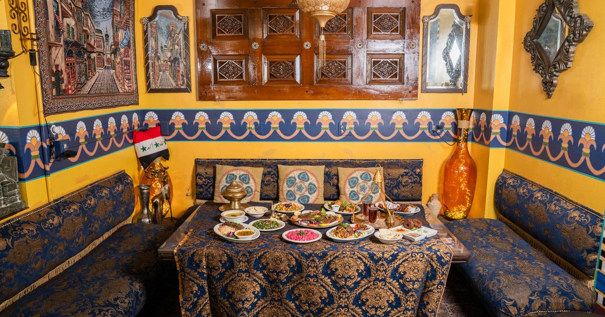 Interior, private dining area, banquette benches with table, various decoration