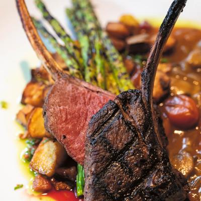 Rack of lamb, served with roasted potatoes and asparagus.