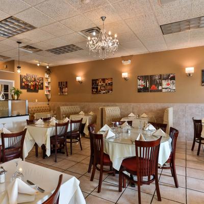 Interior with tables ready for guests.