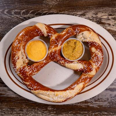 Jumbo Pretzel with beer cheese and mustard dips.
