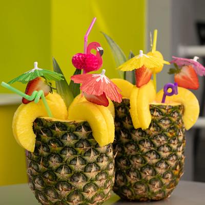 Smoothies in pineapples.
